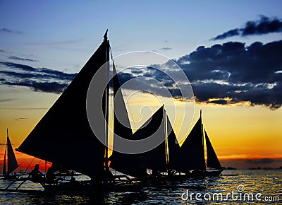 Sailing boats at sunset Stock Photo