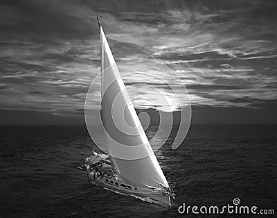 Sailing at dawn Stock Photo