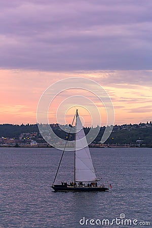 Sailing on Puget Sound at Sunset in Seattle WA Stock Photo