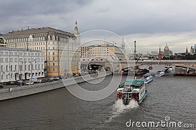 Moscow, Russia â€“ August 16, 2019: Sailing river pleasure boats under the Bolshoi Moskvoretsky Bridge Editorial Stock Photo