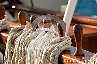 Sailing rope on belaying pins Stock Photo