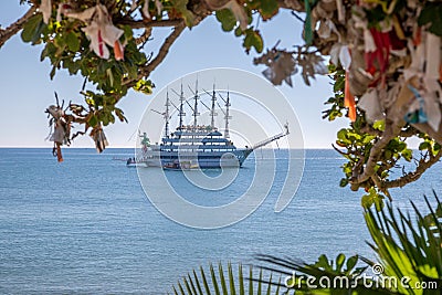 Sailing ship anchors in the port of Side in fine weather Stock Photo