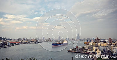 A sailing ship and city view at Kaohsiung harbor (Gao Xiong, Taiwan) Stock Photo