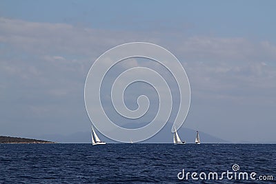 Sailing ship yachts with white sails in race the regatta in the open sea Editorial Stock Photo