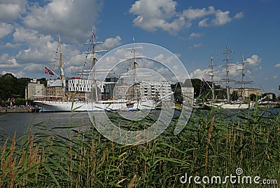 Sailing ships near embankment Stock Photo