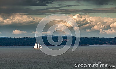 Sailing under cloudy skys Vancouver Island. Stock Photo