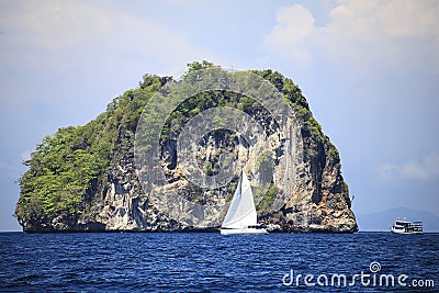 Sailing yacht on the background of a picturesque island. Thailand Stock Photo