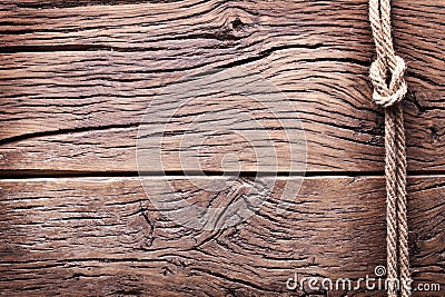 Sailor's knot over old wood. Stock Photo