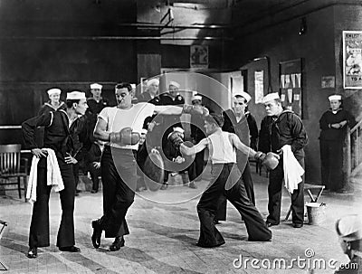 Sailors having boxing match Stock Photo