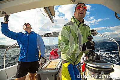 Sailors participate in sailing regatta 12th Ellada Autumn 2014 among Greek island group in the Aegean Sea Editorial Stock Photo