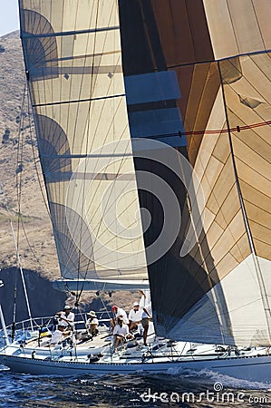 Sailors working on sailboat Stock Photo