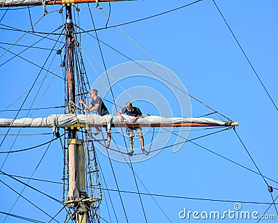 Sailors working on Sails - Tall Ships Parade On Lake Michigan in Kenosha, Wisconsin Editorial Stock Photo