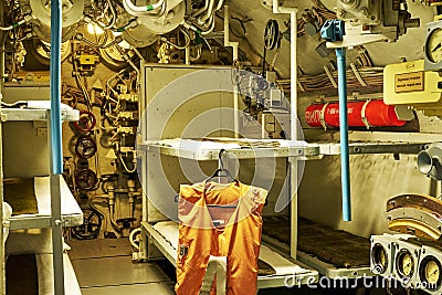 sailors' beds and other equipment in the compartment of an old diesel submarine Editorial Stock Photo