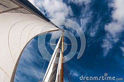 Sails against blue sky Stock Photo