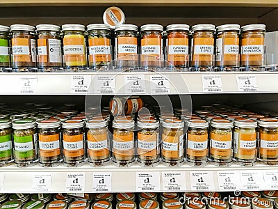 Sainsbury`s supermarket shelves with a huge selection of culinary herbs and spices Editorial Stock Photo