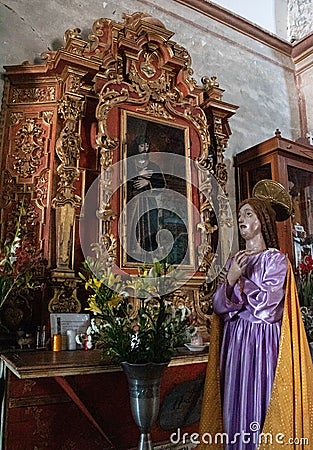 Saint and altarpiece. Teotitlan del Valle, Oaxaca, Mexico Editorial Stock Photo