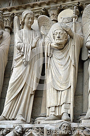 Saint Denis Statue at Notre Dame Cathedral, Paris, France Stock Photo