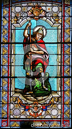 Saint George slaying the Dragon- Stained Glass Stock Photo