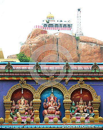 Saint indian god and goddess statue at malaikottai vinayagar temple. Stock Photo