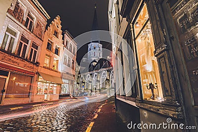 Saint James Cathedral and Night Street in Ghent Editorial Stock Photo