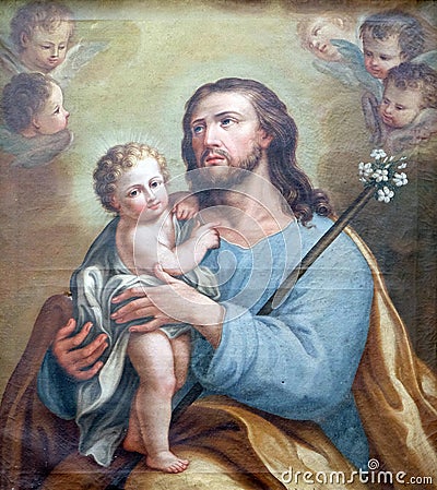 Saint Joseph holding baby Jesus Editorial Stock Photo