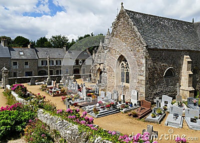 The Saint-Loup church of Lanloup and the closed cemetery Editorial Stock Photo