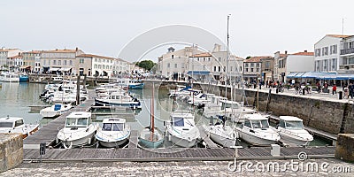 Saint Martin de RÃ©, Charente Maritime / France - 05 01 2019 : Old harbor in ancient town of St. Martin de RÃ© in Ile de Re in Editorial Stock Photo