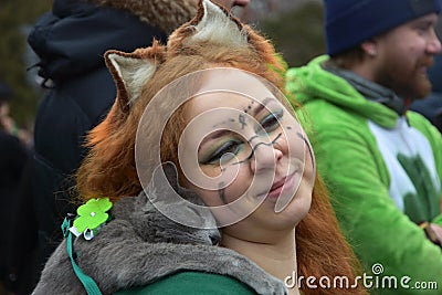 Saint Patrick`s Day celebration in Moscow. Men and women in carnival costumes Editorial Stock Photo