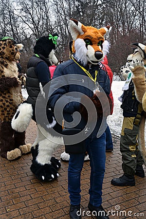 Saint Patrick`s Day celebration in Moscow. Men and women in carnival costumes Editorial Stock Photo