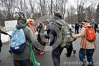 Saint Patrick`s Day celebration in Moscow. Men and women in carnival costumes Editorial Stock Photo