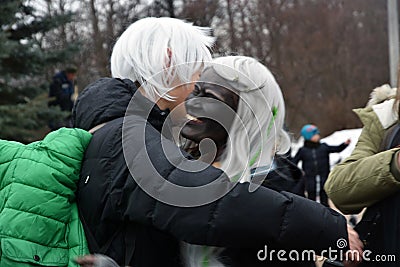 Saint Patrick`s Day celebration in Moscow. Men and women in carnival costumes Editorial Stock Photo