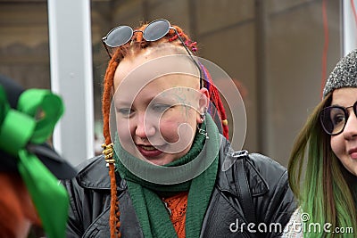 Saint Patrick`s Day celebration in Moscow. Women in carnival costume Editorial Stock Photo