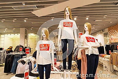 Saint-Peterburg, Russia - January 6, 2020. SALE. Fashion Mannequins Standing In shop. Casual dress Clothing Shop In Shopping Mall Editorial Stock Photo