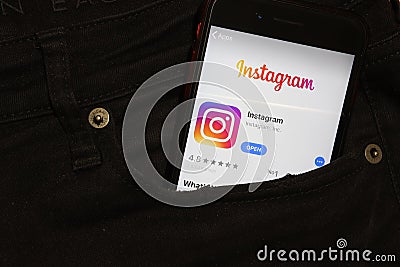 Saint-Petersburg, Russia - 6 December 2019: Mobile phone screen with Instagram icon in pocket close-up, Illustrative Editorial Editorial Stock Photo