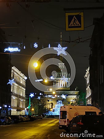 Gorokhovaya street, decorated with stars for Christmas and New Year, a view of the Admiralty of St. Petersburg Editorial Stock Photo