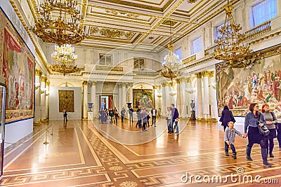 Tourists in the St. George Hall of State Hermitage Museum. Saint Petersburg. Russia Editorial Stock Photo