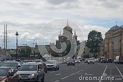 Saint Petersburg, Russia - July 07, 2017: Cars on the embankment of Lieutenant Schmidt. View of the Assumption Church Editorial Stock Photo