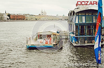 Pleasure boat for tourists on the Neva River in St. Petersburg Editorial Stock Photo