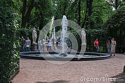 View of the Summer Garden park opened after the Covid-19 pandemic in the city center, the main fountain with many sculptures, visi Editorial Stock Photo