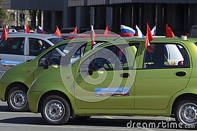 Annual rally on flag-decorated small cars in memory of the Great Patriotic War 1941-1945 Editorial Stock Photo
