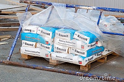 bags of plaster on the construction site. Selective Focus Editorial Stock Photo