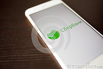 SAINT PETERSBURG, RUSSIA - MAY 14, 2019: Logo of the Russian sberbank on the smartphone screen Editorial Stock Photo