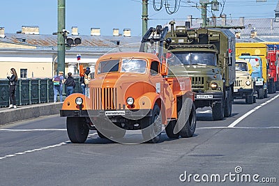 Technological tractor assembled from two Soviet trucks of the ZiL-164 and MAZ-200 Editorial Stock Photo