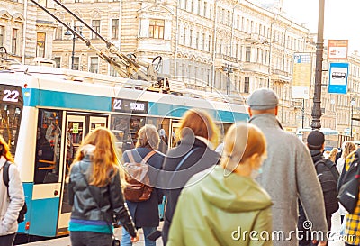 Saint Petersburg, Russia October 4, 2021, A crowd of people in the city walks to a public transport stop during the coronavirus Editorial Stock Photo