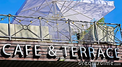 Rooftop cafe, open terrace with green chairs Editorial Stock Photo