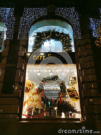 Showcase of the House of Books decorated with fairy-tale characters from Soviet postcards for Christmas and New Year Editorial Stock Photo