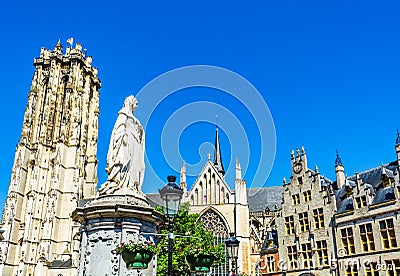 Saint Rumbold`s Cathedral and the statue of Archduchess Margaret of Austria in Mechelen, Belgium Stock Photo