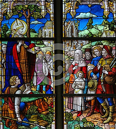 Saint Rumbold - Stained Glass in Mechelen Cathedral Stock Photo