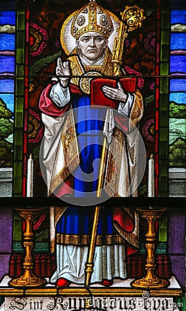 Saint Rumbold - Stained Glass in Mechelen Cathedral Stock Photo