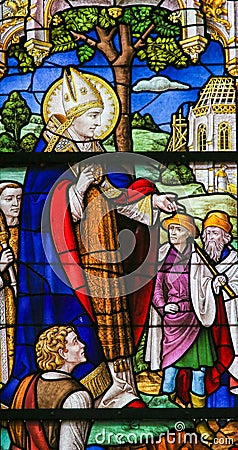 Saint Rumbold - Stained Glass in Mechelen Cathedral Stock Photo